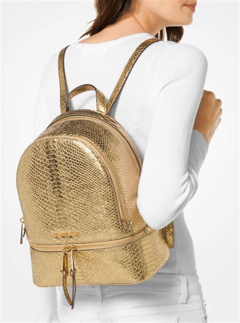 michael michael kors leather charms rhea backpack|michael kors clear backpack.